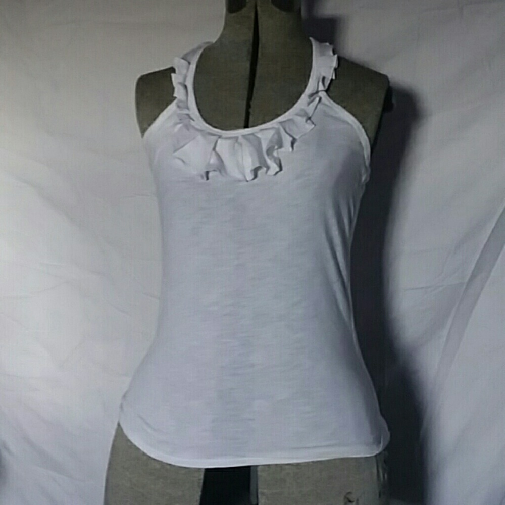 White frilly tank top.
